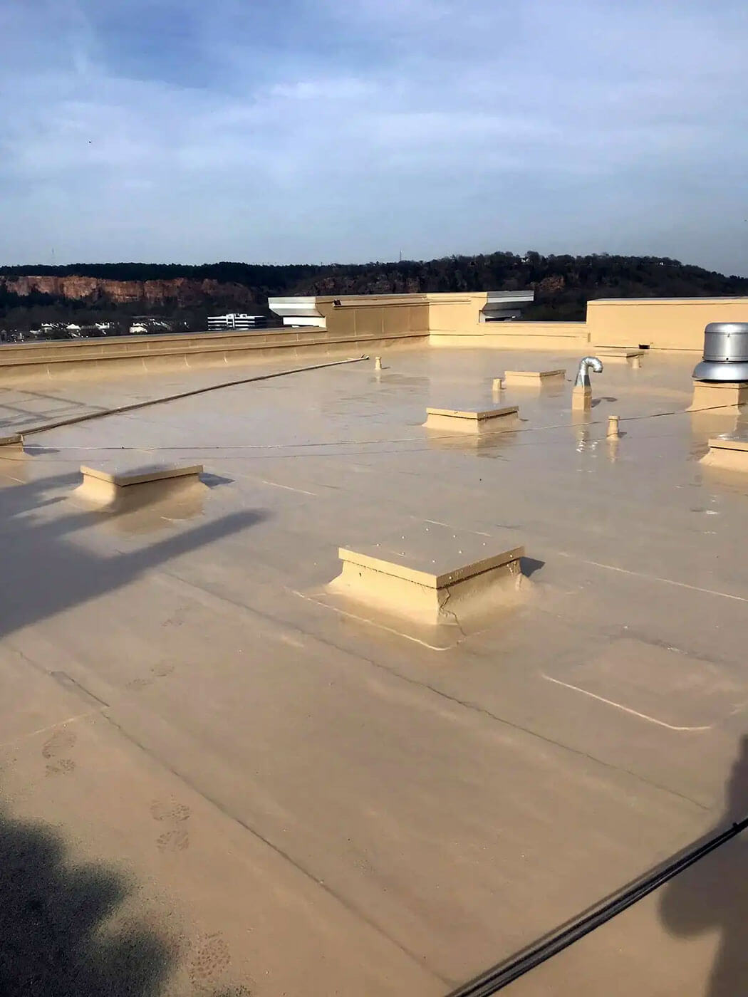 Commercial flat roof restoration with polyurea coating — project 5