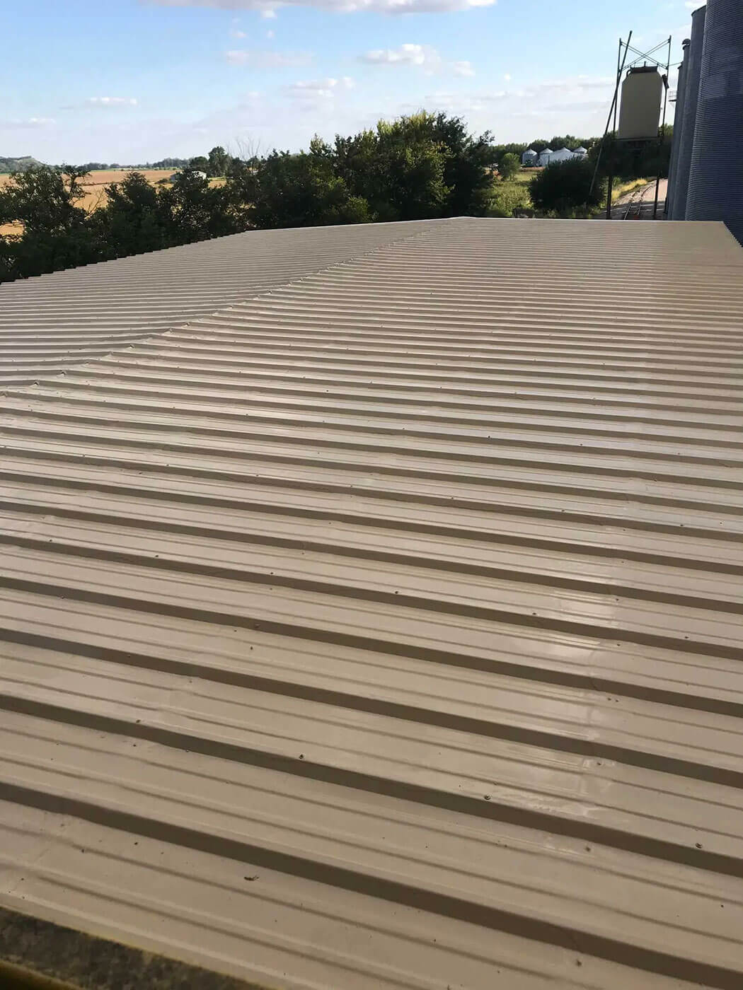 Polyurea-coated commercial metal roof system — project 1